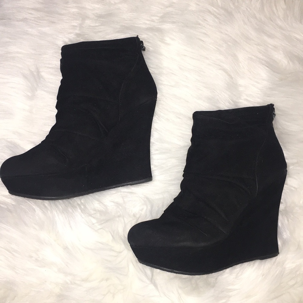 Black high heeled booties size 7